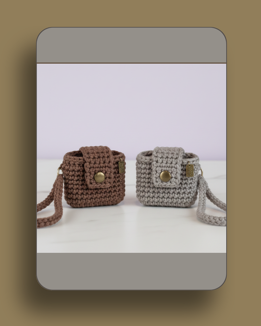 bag design crochet earbud case, crochet bag earphone pouch, handmade crochet earbud holder, cute crochet earbud case, aesthetic crochet accessory, crochet keychain earbud case, portable crochet earphone case, giftable crochet earbud case, unique crochet earbud holder, crochet bag charm, crochet accessory for earbuds, handmade crochet gadget case, crochet bag style earbud pouch, lightweight crochet earbud case, crochet gift for friends