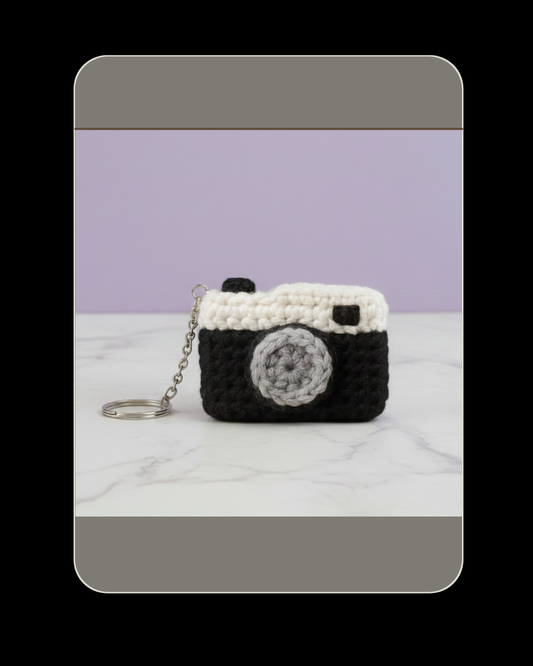 crochet camera keychain, handmade crochet keychain, crochet bag charm, cute crochet keychain, crochet accessory pakistan, photography lover gift, aesthetic crochet keychain, crochet keychain for gifts, handmade crochet accessory, lightweight crochet keychain, crochet camera charm, unique crochet keychain, giftable crochet keychain, crochet keychain for bags, crochet handmade gift
